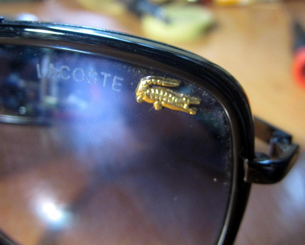 Солнцезащитные очки Lacoste, Италия. Пластик 4