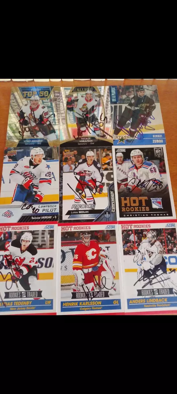 9 автографов NHL/AHL