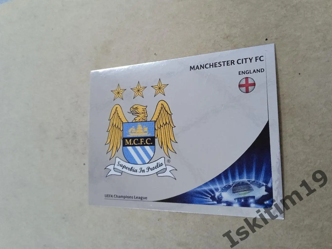 Наклейка PANINI Лига Чемпионов УЕФА 2012-2013 № 246 Манчестер Сити герб