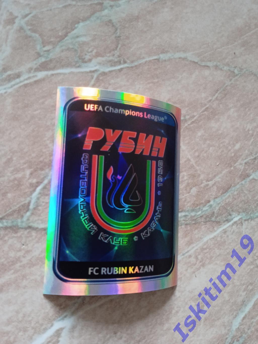 Наклейка PANINI Лига Чемпионов УЕФА 2010-2011 № 260 Рубин Казань герб
