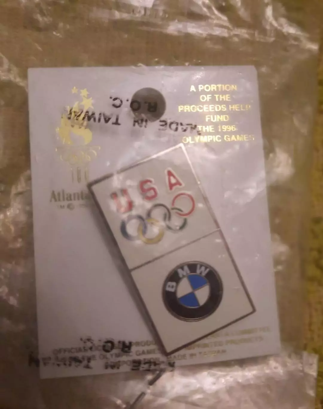Знак Олимпиада США авто BMW