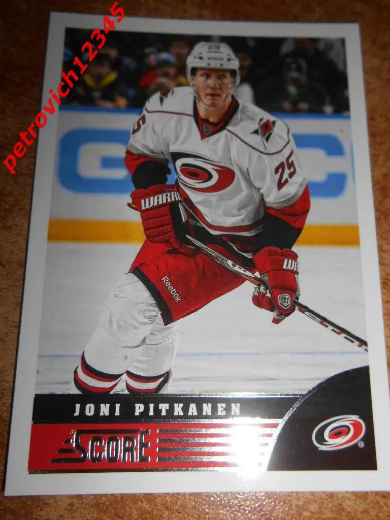 хоккей.карточка= Joni Pitkanen (Carolina Hurricanes)
