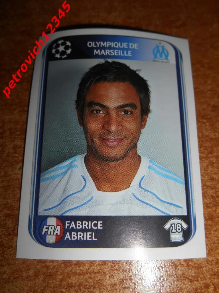 Наклейка PANINI Лига Чемпионов УЕФА 2010-2011 = Fabrice Abriel (Olympique )