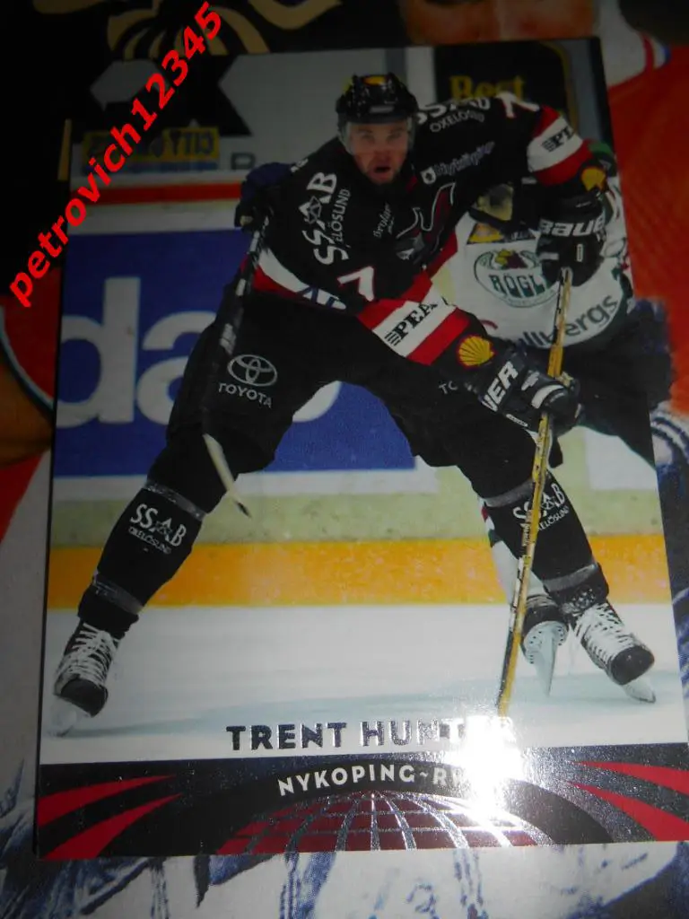 хоккей.карточка = 72 - Trent Hunter - Nykoping - 2004-05 UD All-World Edition