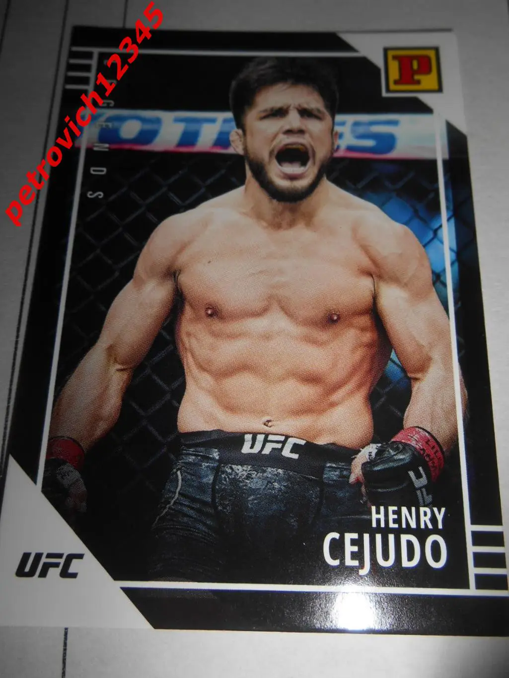 карточка - PANINI UFC Debut edition 2022. - Henry Cejudo